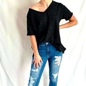 Super cute off the shoulder or you could even wear it like a regular shirt!